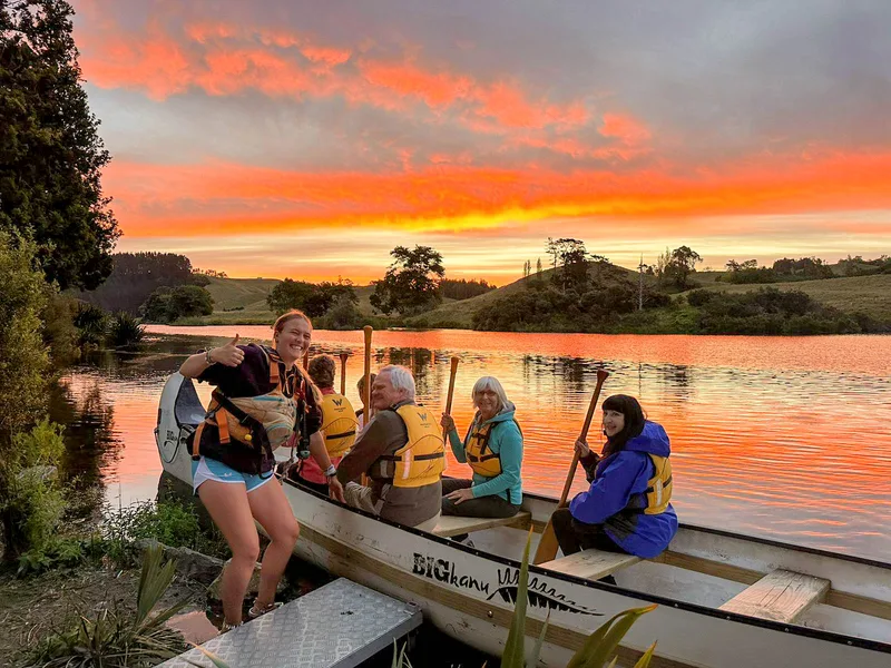 Gathering at the Big Kanu under a fiery Lake McLaren sunset