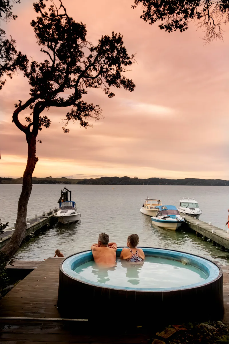A private hot tub on the jetty at sunset