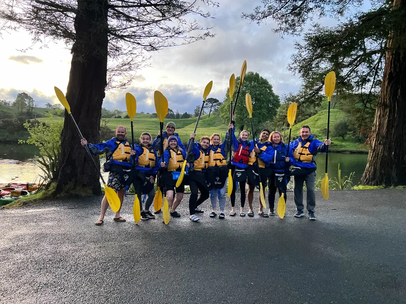 Paddles raised for a private group photo