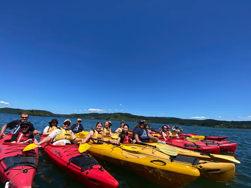 A private group rafted up under a clear blue sky