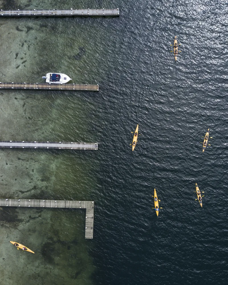 Kayaks from above on the clear water of Lake Rotoiti