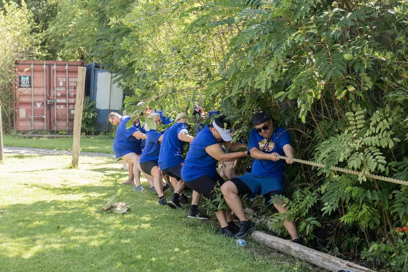 A tug of war on the grass